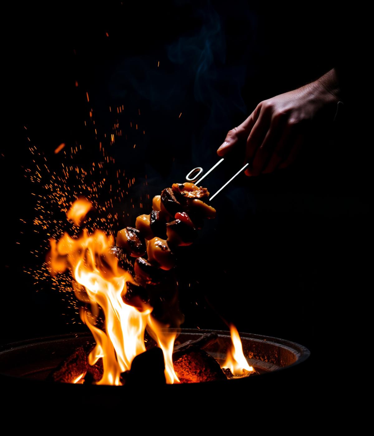 Chef grilling skewers